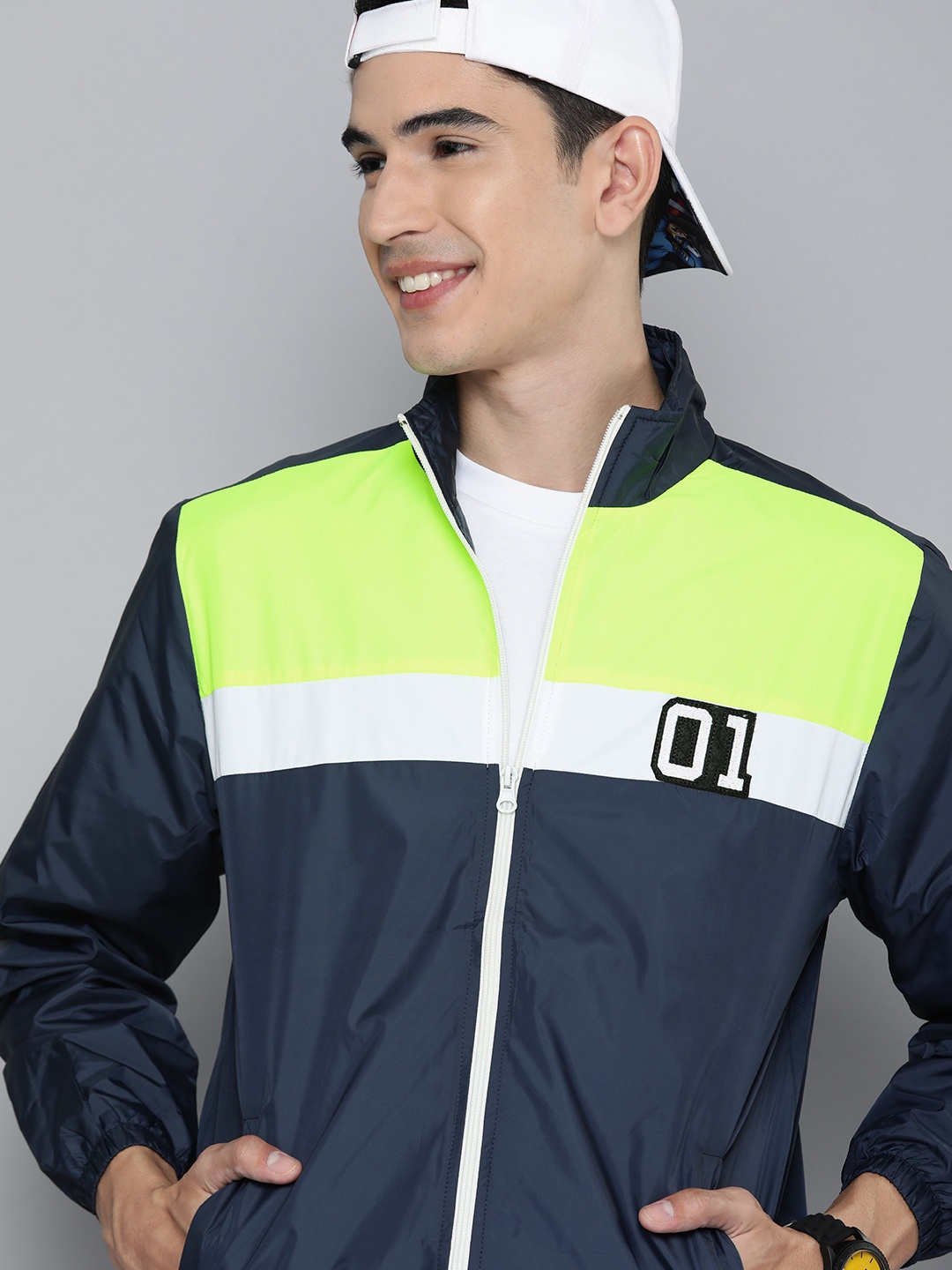 

HERE&NOW Men Navy Blue Lime Green Colourblocked Lightweight Sporty Jacket