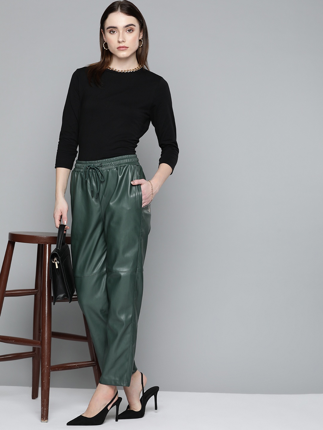 

Chemistry Women Green Coated Faux Leather Regular Trousers