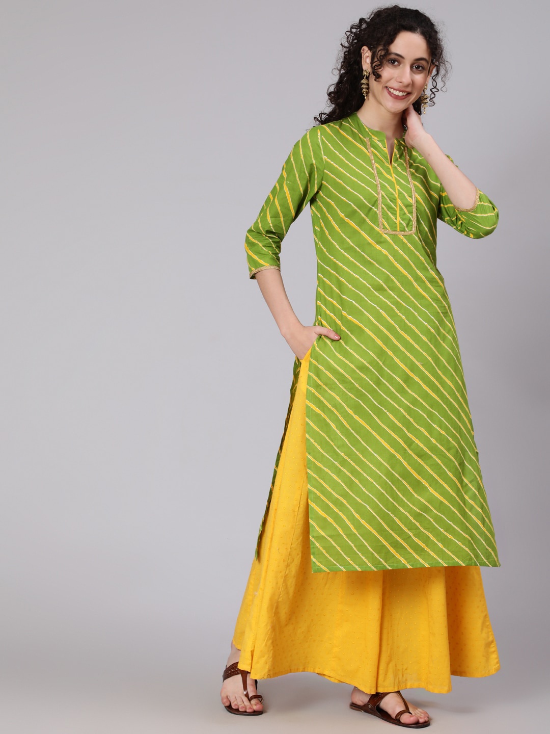 

Awadhi Women Green Striped Mirror Work Anarkali Kurta