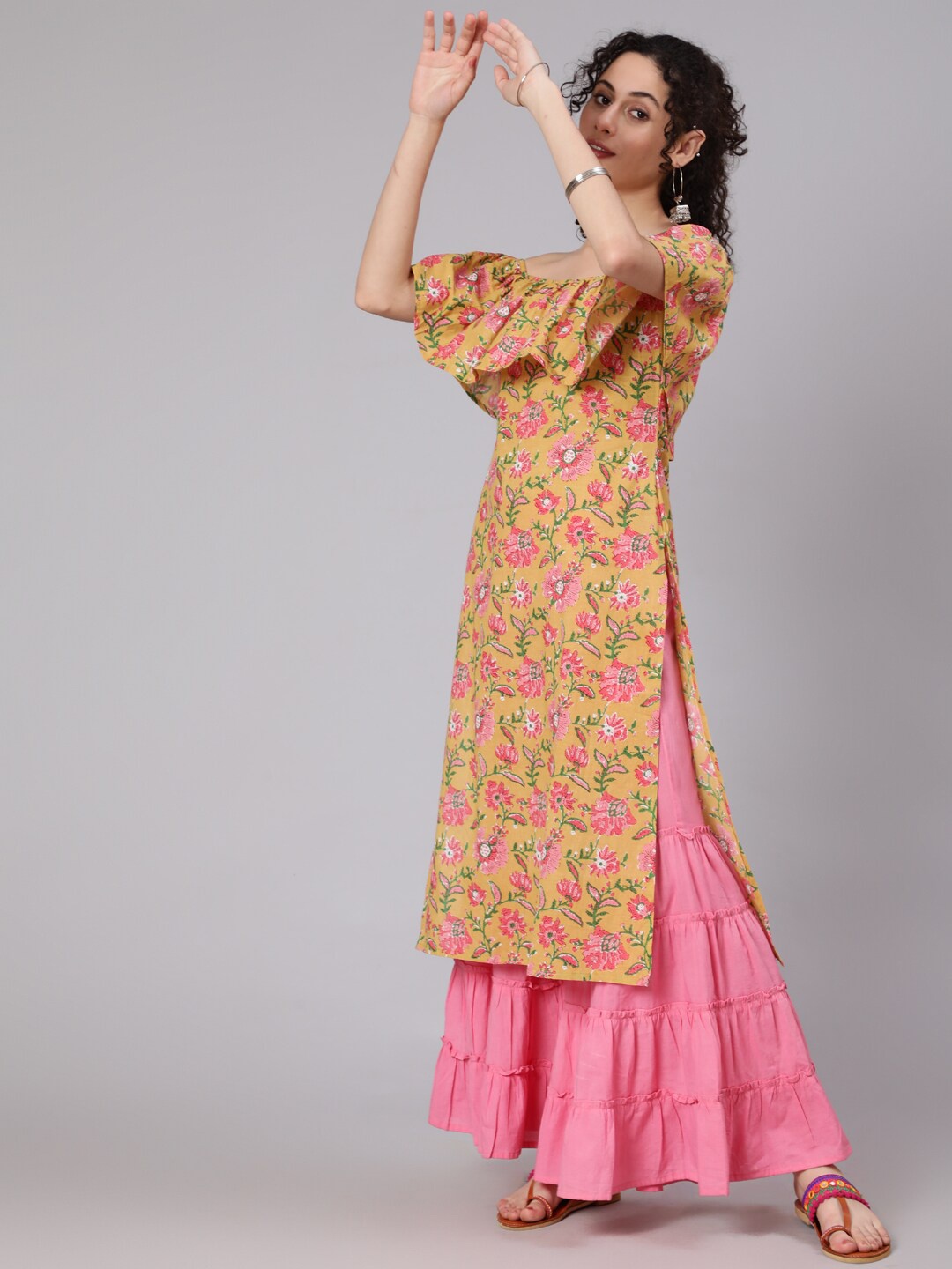 

Awadhi Women Yellow Floral Printed Keyhole Neck Mirror Work Kurta