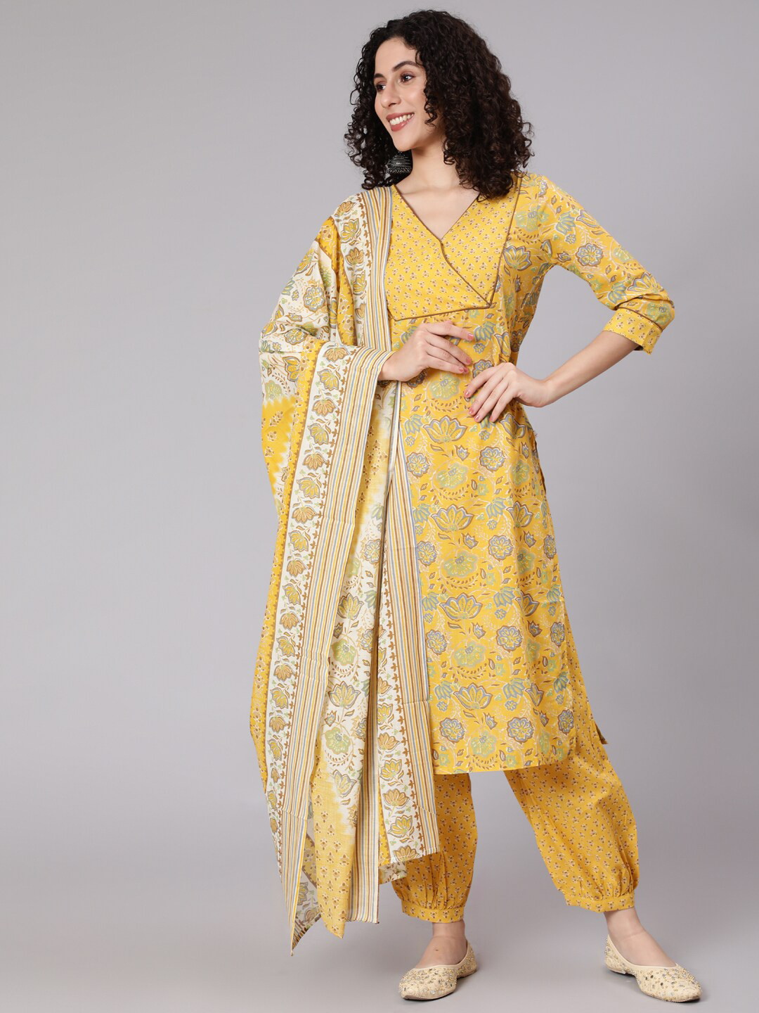 

Awadhi Women Yellow Floral Printed Kurta with Salwar & With Dupatta