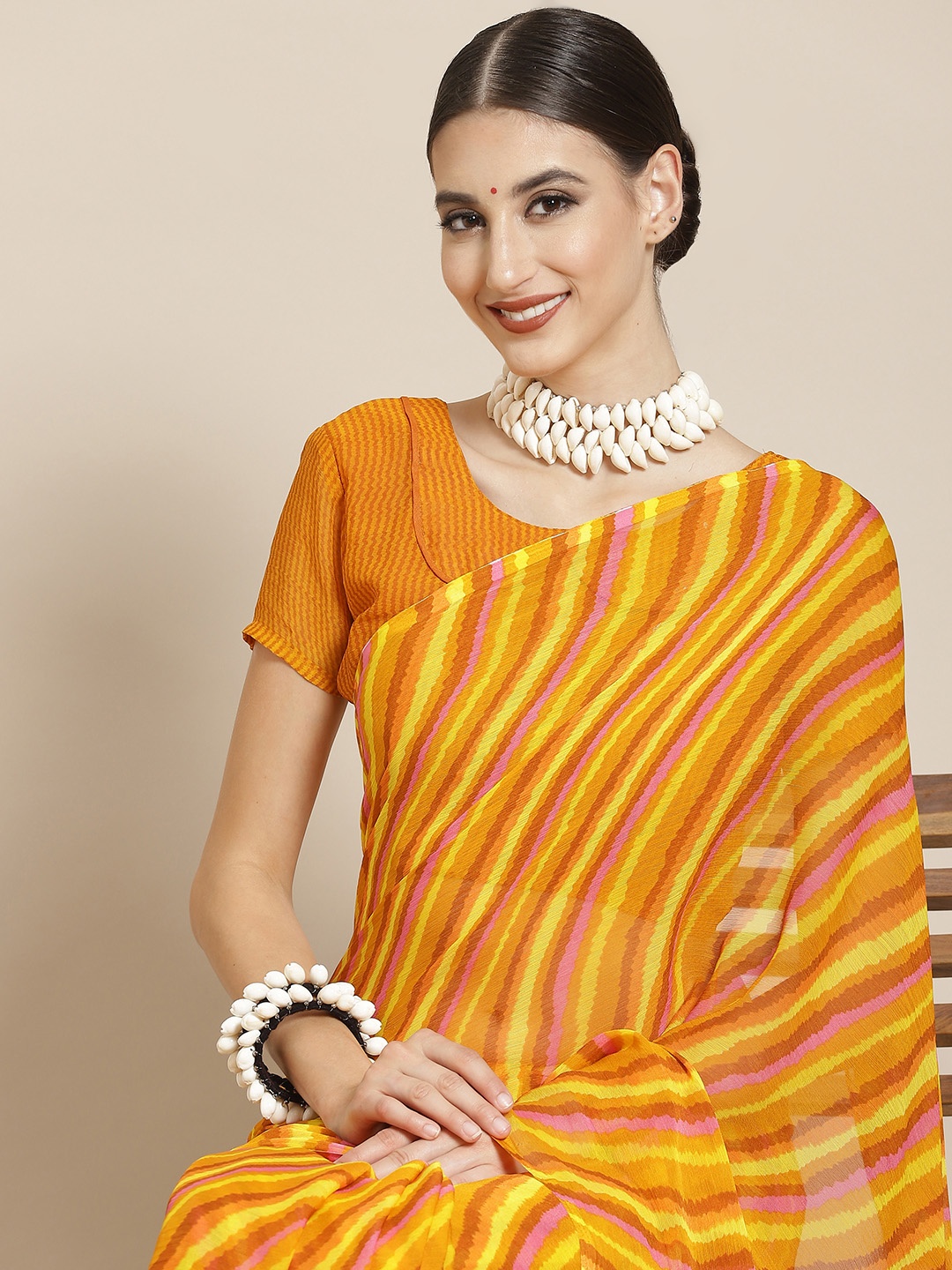 

Satrani Mustard Yellow & Pink Leheriya Pure Chiffon Leheriya Saree