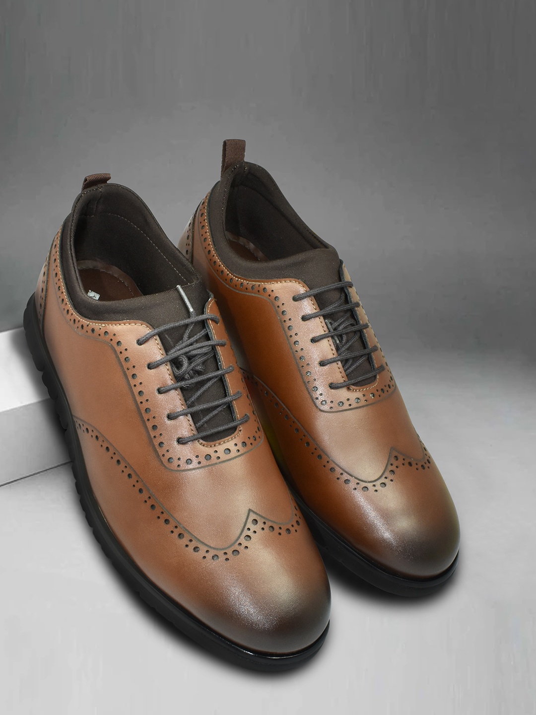 

Ajanta Men Brown Colourblocked Brogues