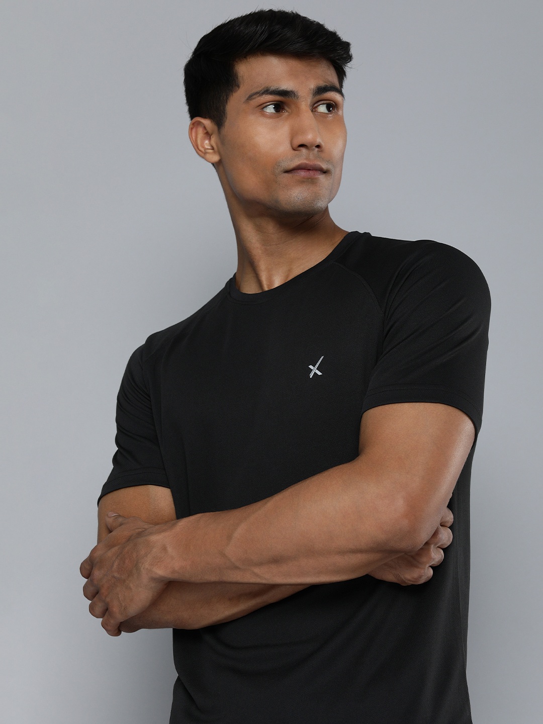 

HRX by Hrithik Roshan Men Solid Running T-shirt, Black