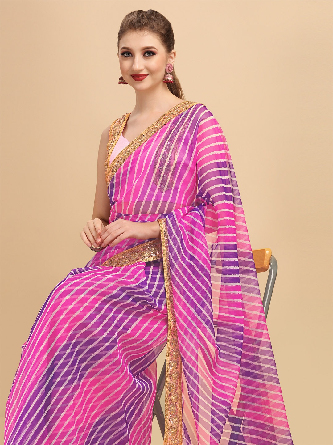 

Sangria Women Purple & Pink Organza Sarees