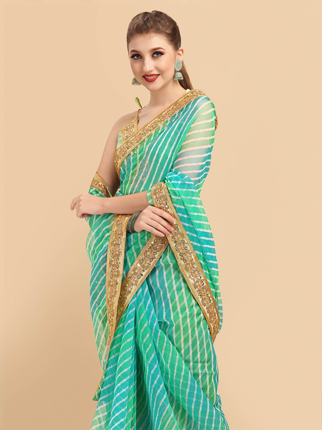 

Sangria Women Sea Green organza Printed Leheriya Embellished celebrity Sarees