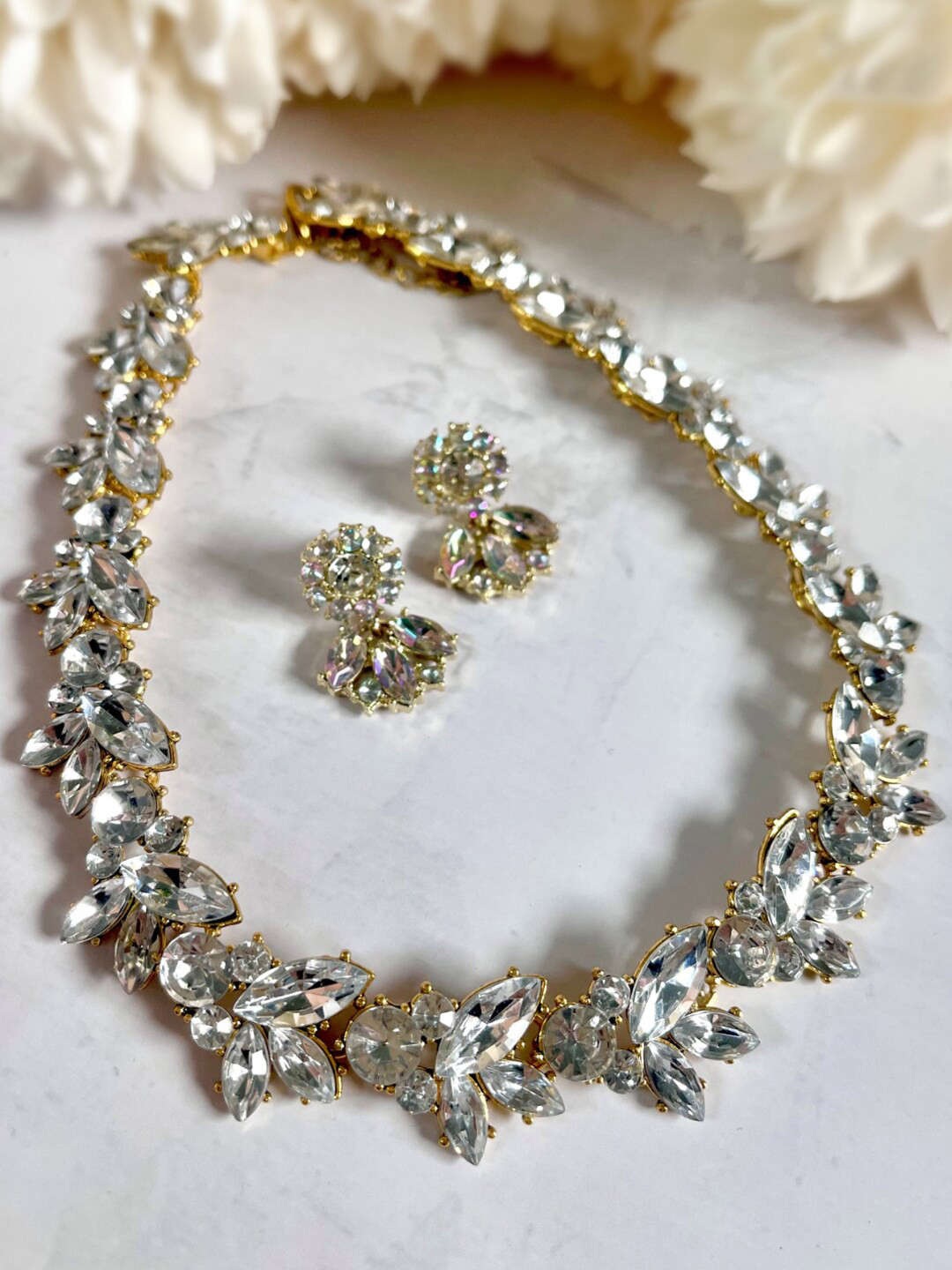

Ishhaara Women Golden Leaf Crystal Necklace With Earrings, Gold