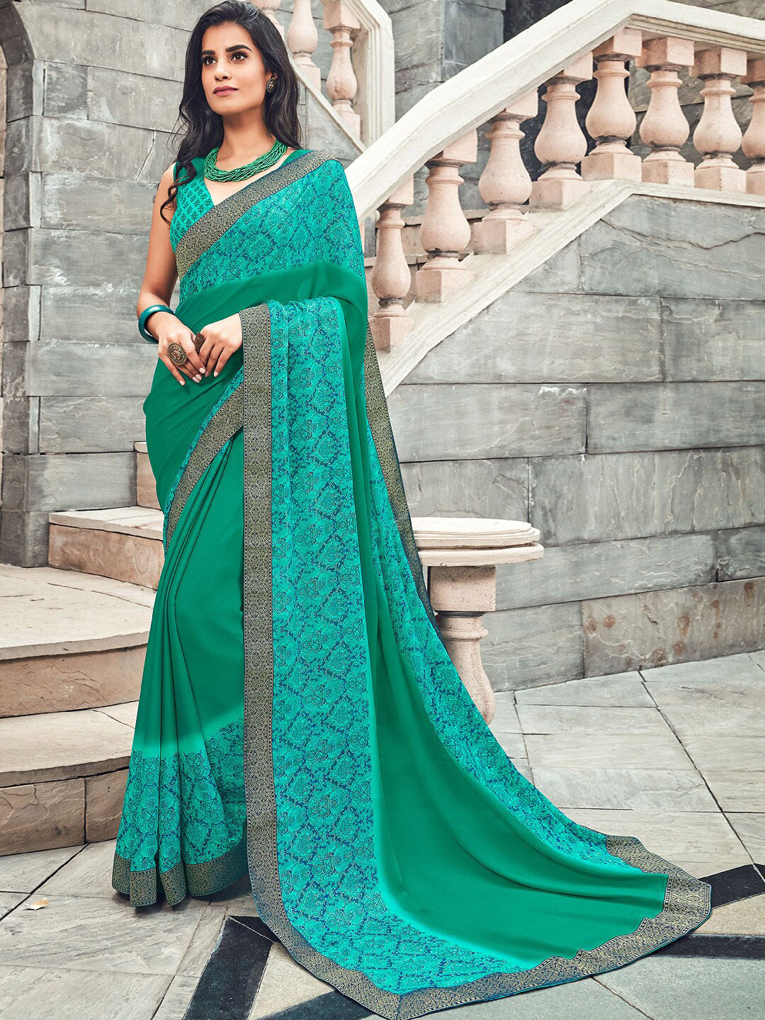 

Shaily Green & Gold-Toned Ethnic Motifs Zari Saree