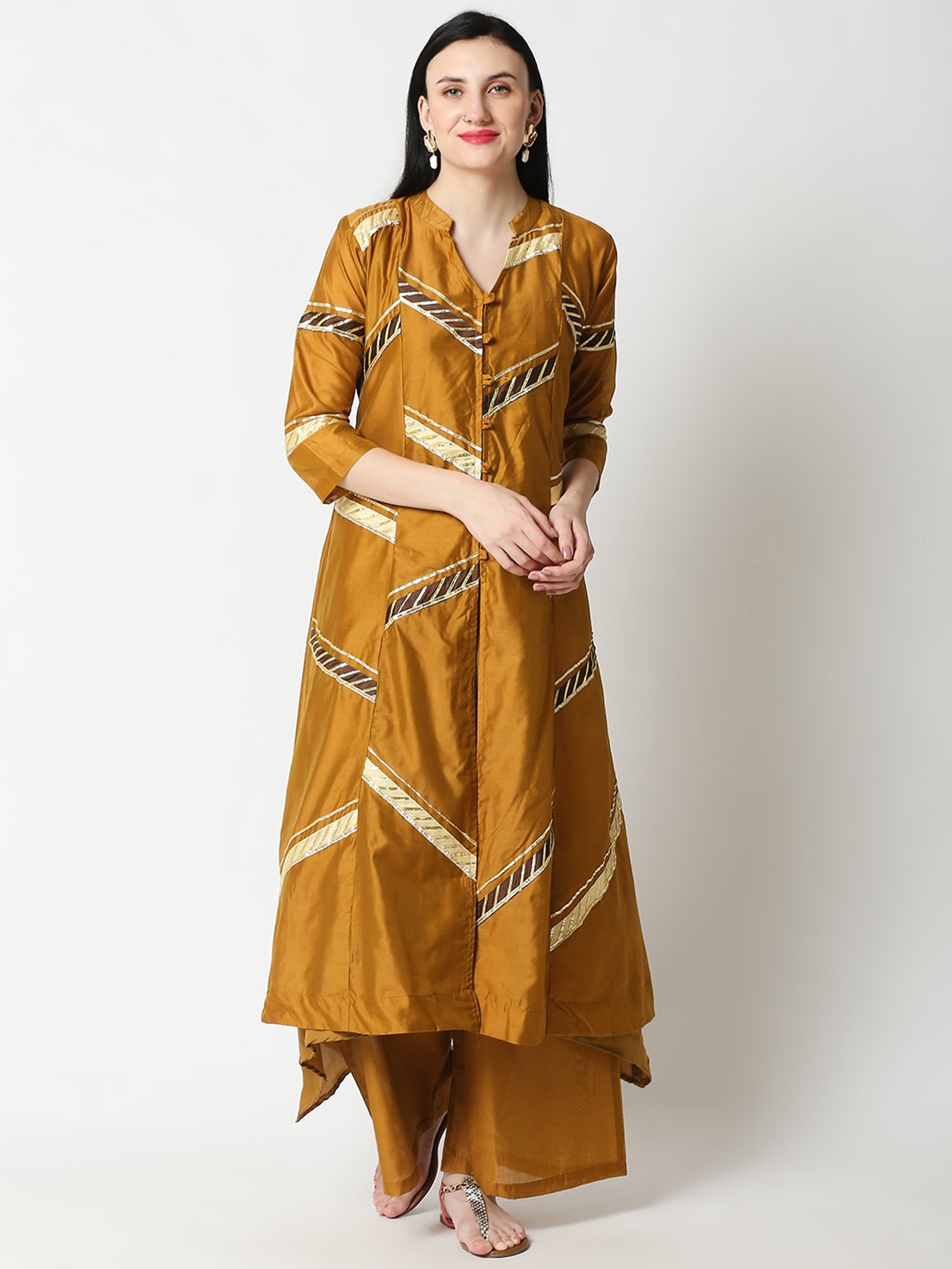 

Aanyor Women Mustard Yellow Gotta Patti Chanderi Silk Kurta with Palazzos