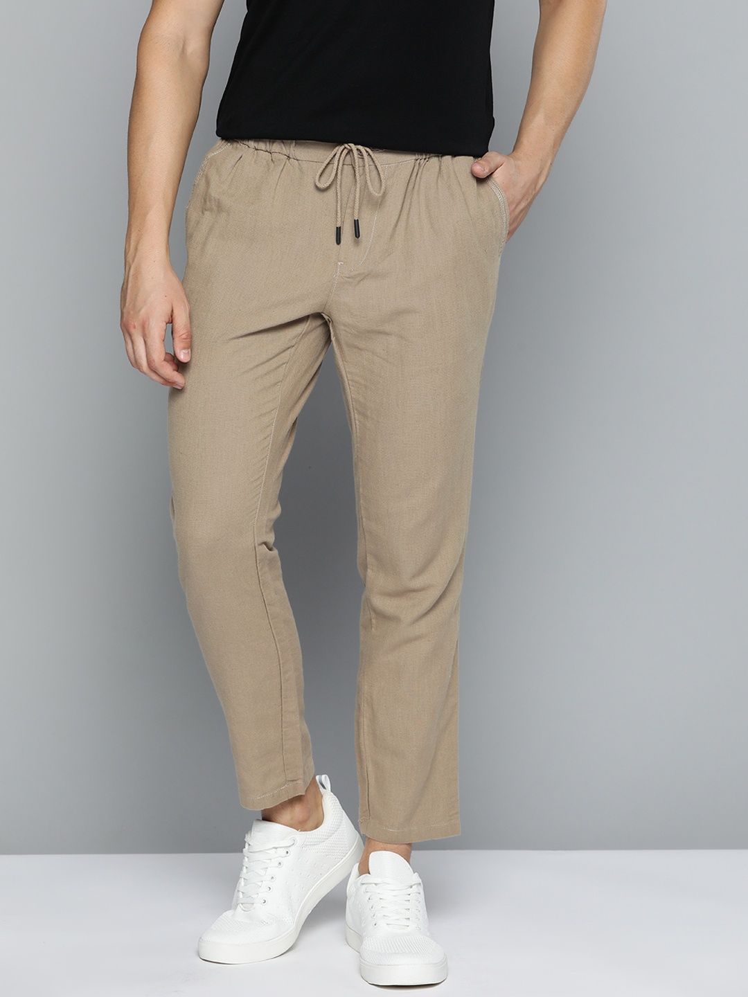 

Mast & Harbour Men Beige Solid Regular Trousers