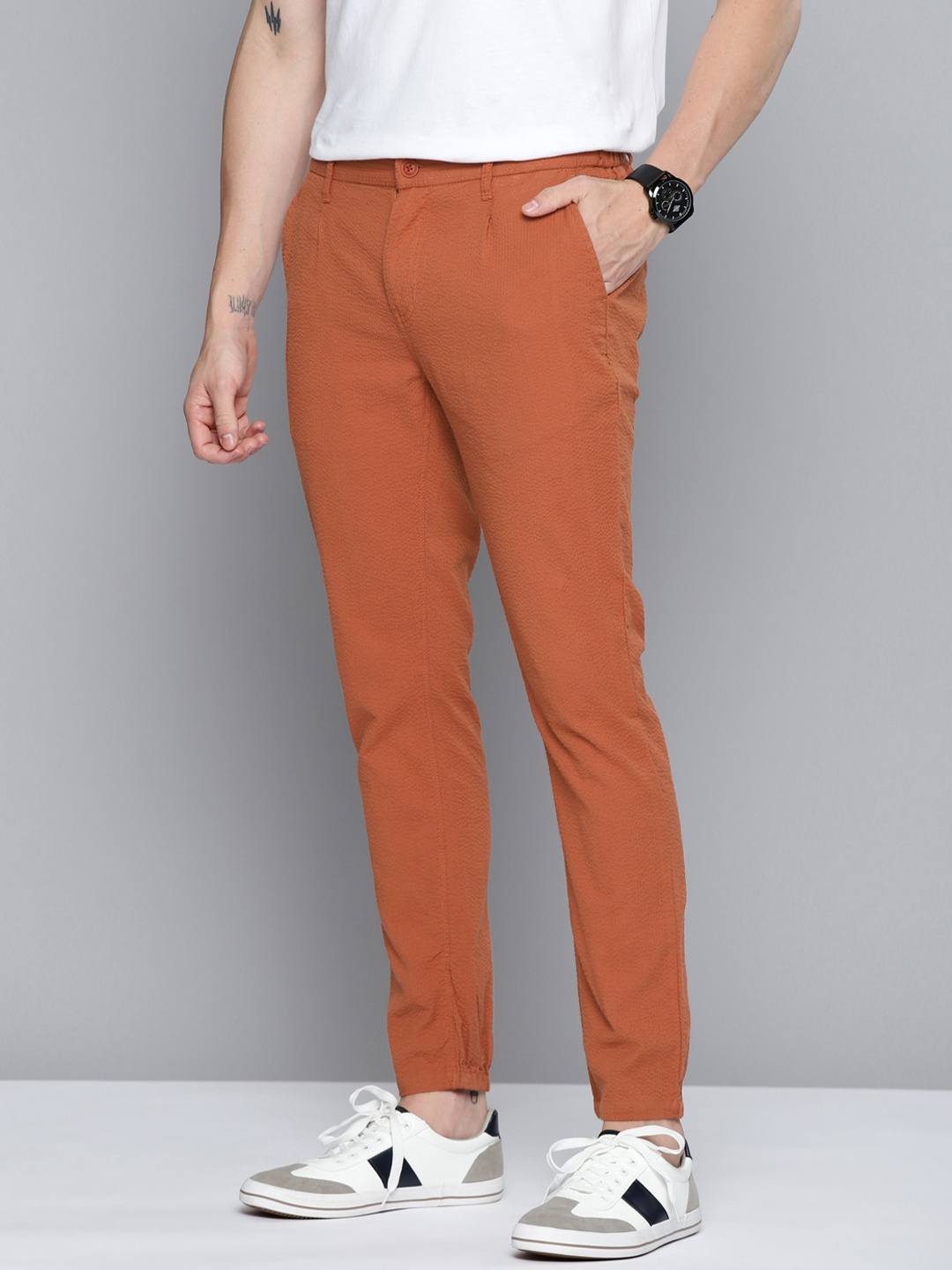 

Mast & Harbour Men Rust Orange Pure Cotton Seersucker Trousers