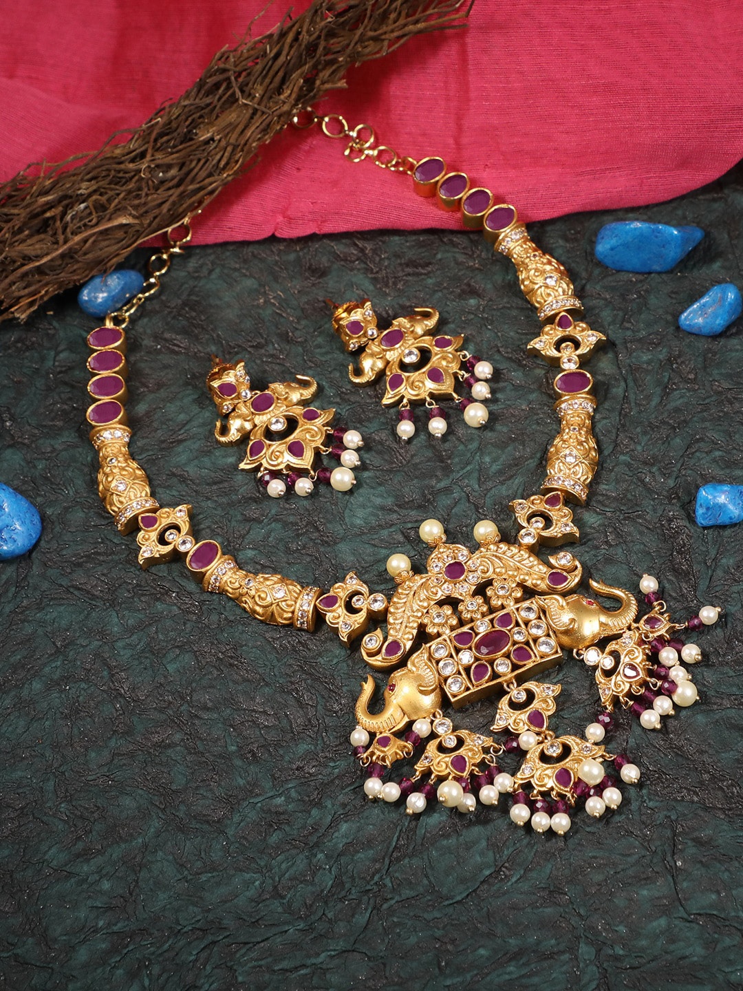 

Adwitiya Collection Gold-Plated Red & White Stone Studded Elephant Antique Jewellery Set