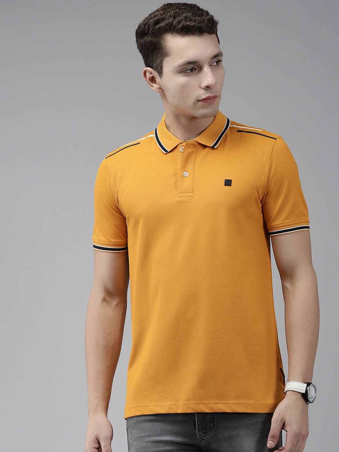 

Van Heusen Sport Men Mustard Yellow Solid Polo Collar T-shirt