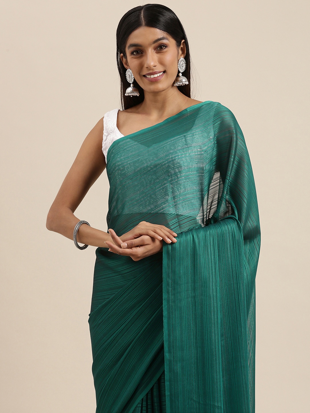 

Mitera Teal Blue Solid Saree