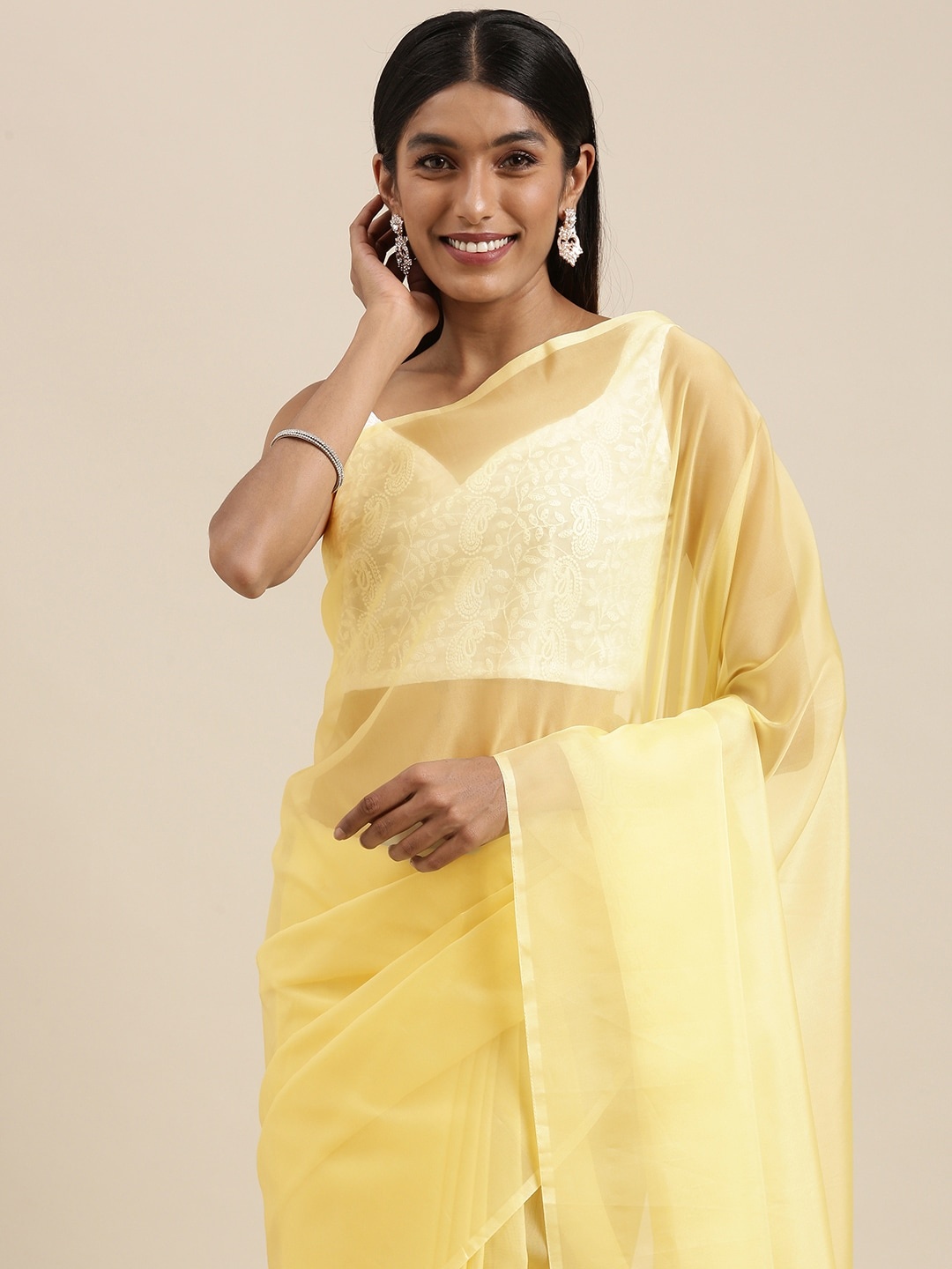 

Mitera Yellow Solid Organza Saree