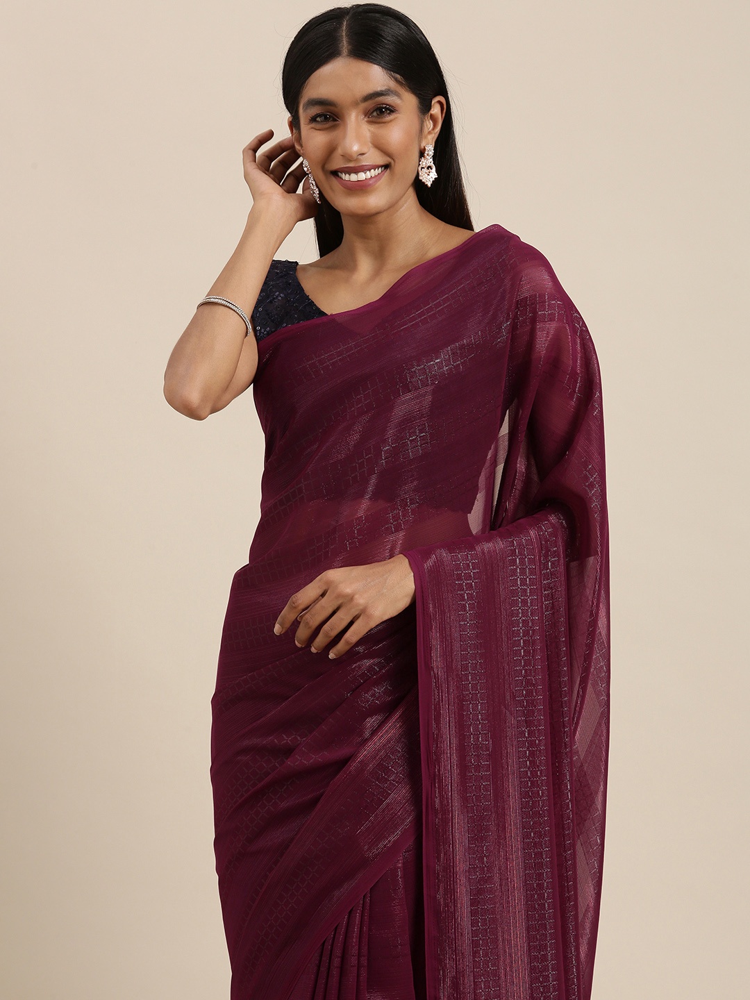 

Mitera Purple Self Striped Saree