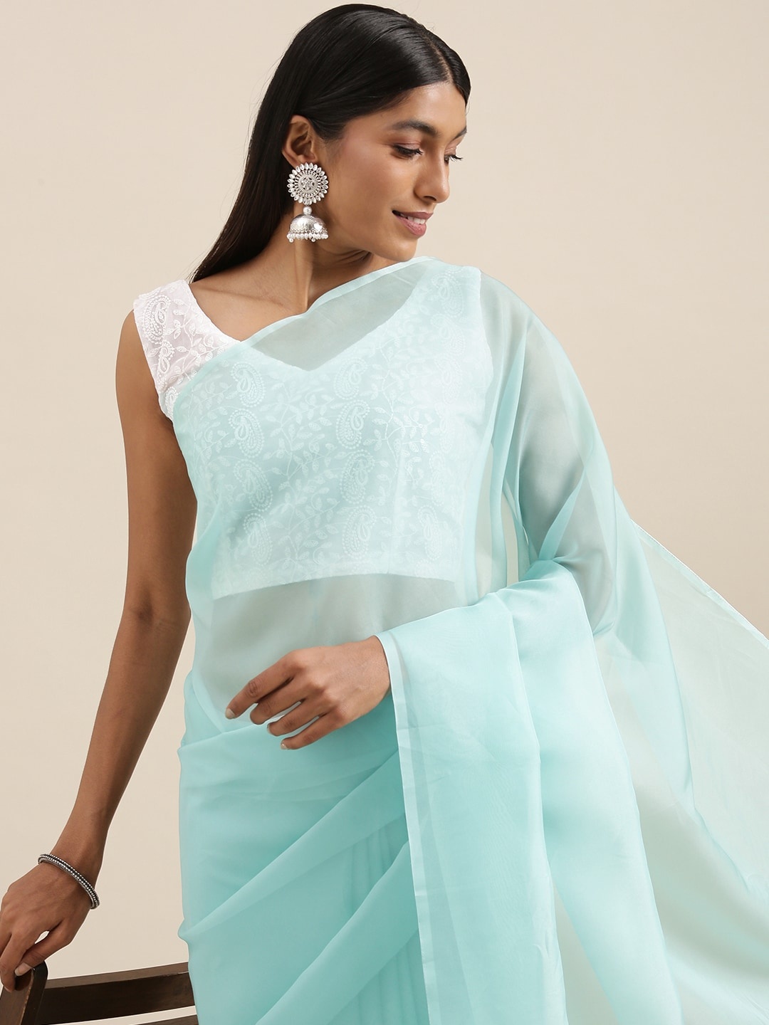 

Mitera Sea Green Solid Organza Saree