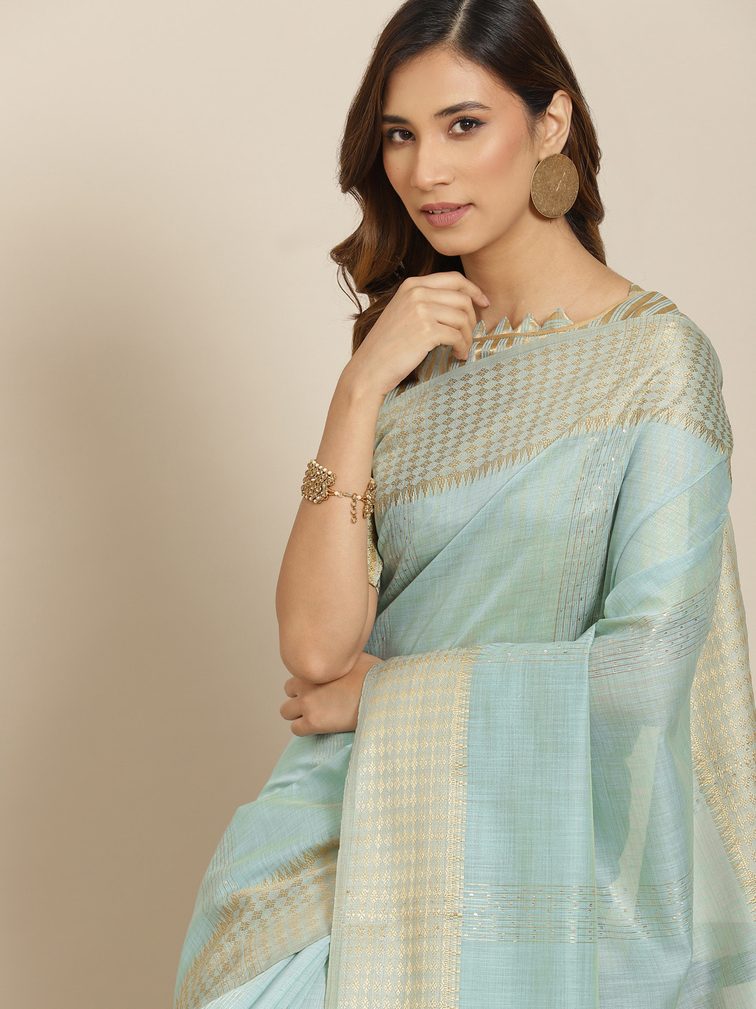 

Mitera Blue & Golden Zari Linen Blend Saree
