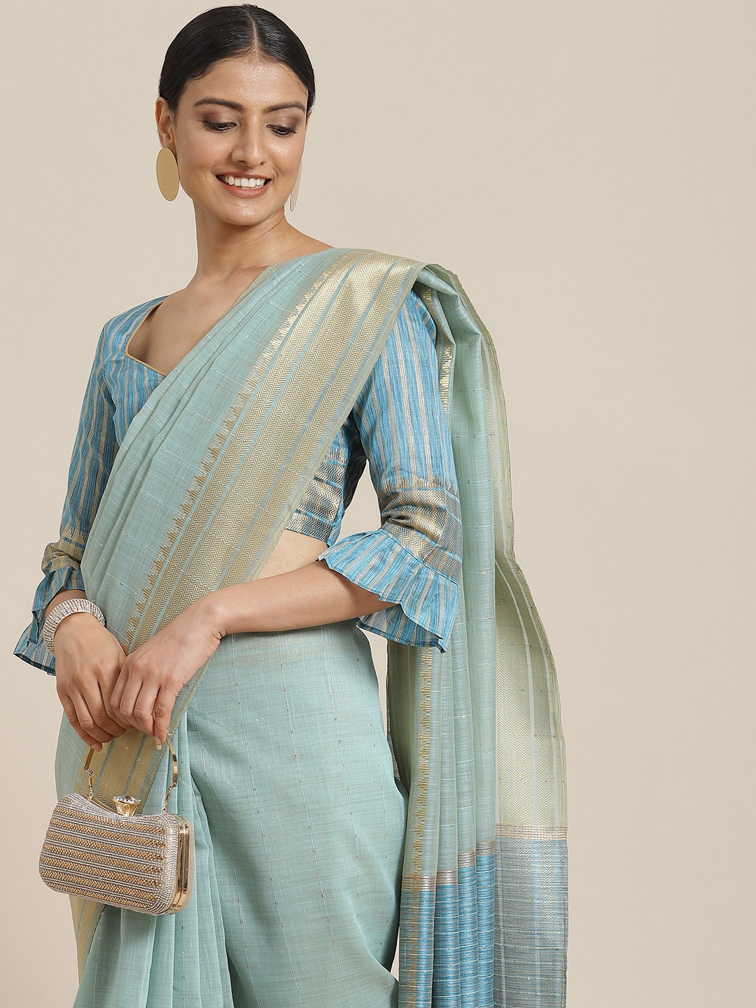 

Mitera Blue & Golden Striped Zari Linen Blend Saree