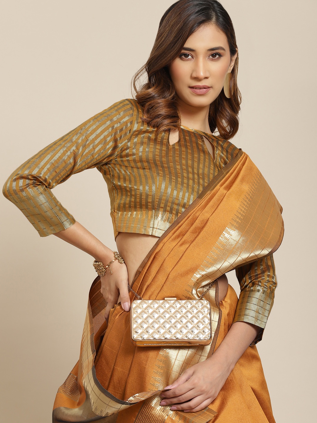 

Mitera Mustard & Golden Zari Silk Blend Saree