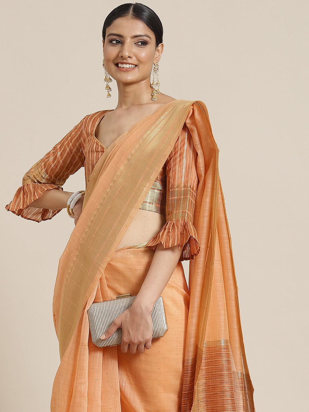 

Mitera Orange Striped Zari Linen Blend Saree