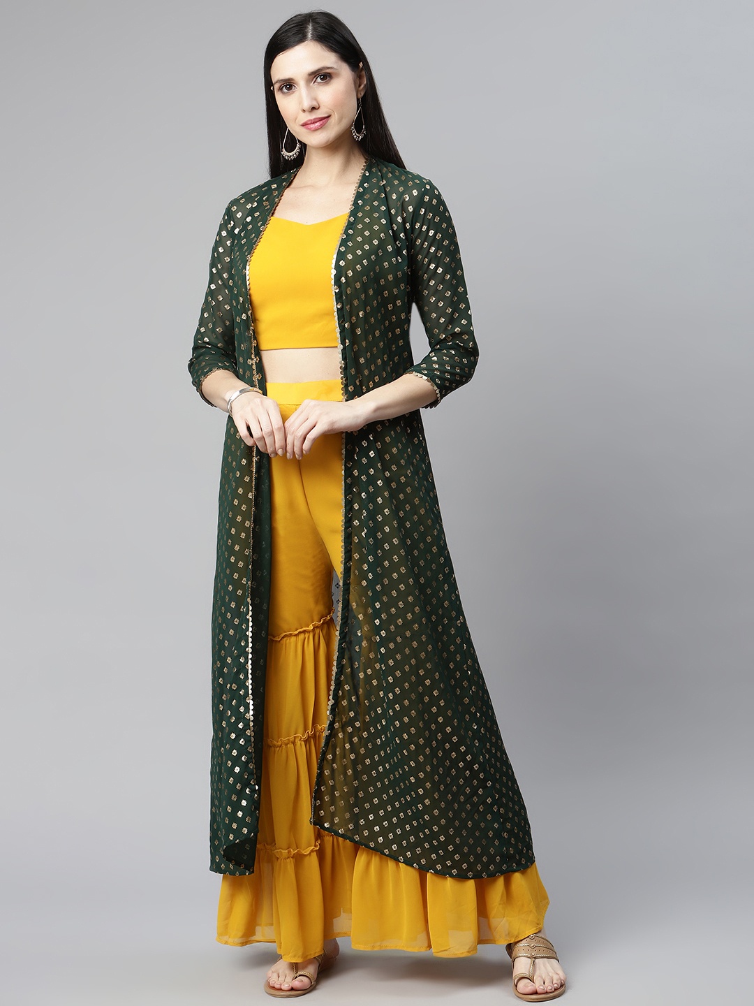 

Myshka Women Green Ethnic Motifs Kurta with Palazzos