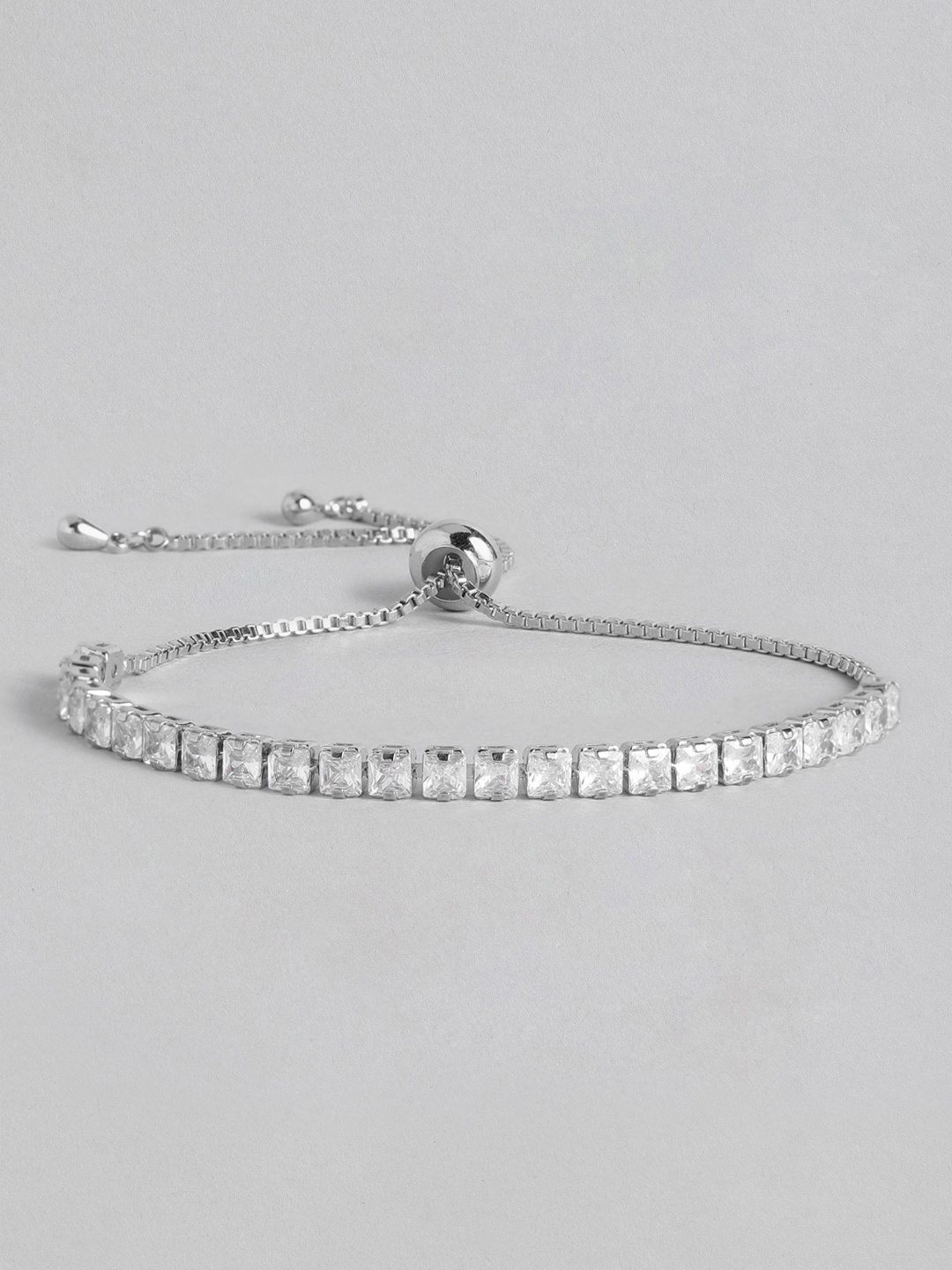 

Peora Women Silver-Toned & Transparent American Diamond Silver-Plated Charm Bracelet