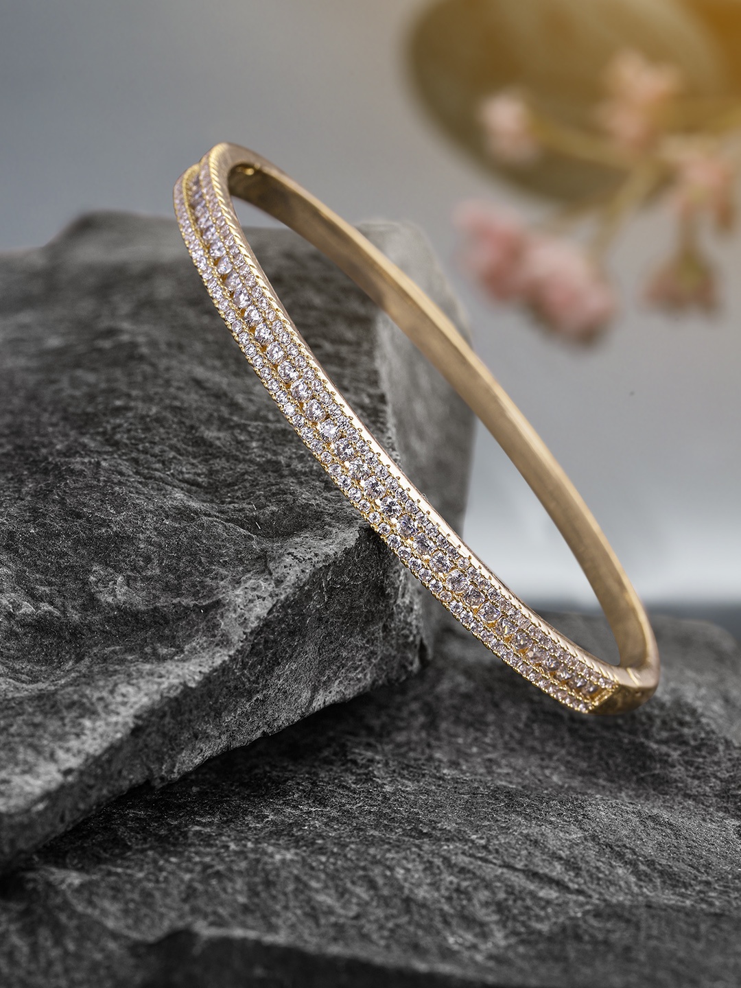 

Peora Women Gold-Toned & Transparent American Diamond Gold-Plated Kada Bracelet