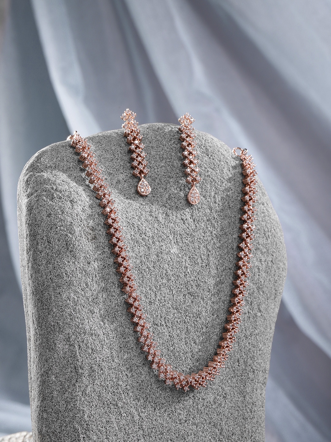 

Peora Rose-Gold Plated American Diamond Stone Jewellery Set