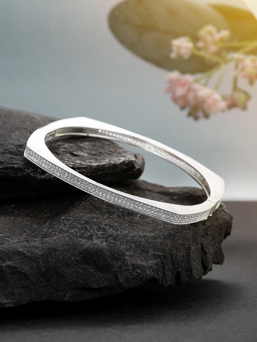 

Peora Women Silver-Toned & Transparent American Diamond Silver-Plated Kada Bracelet