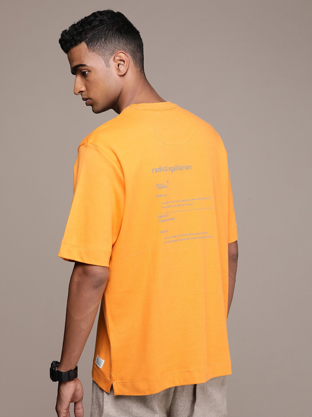

Mr Bowerbird Typography Printed Pure Cotton Oversized T-shirt, Mustard