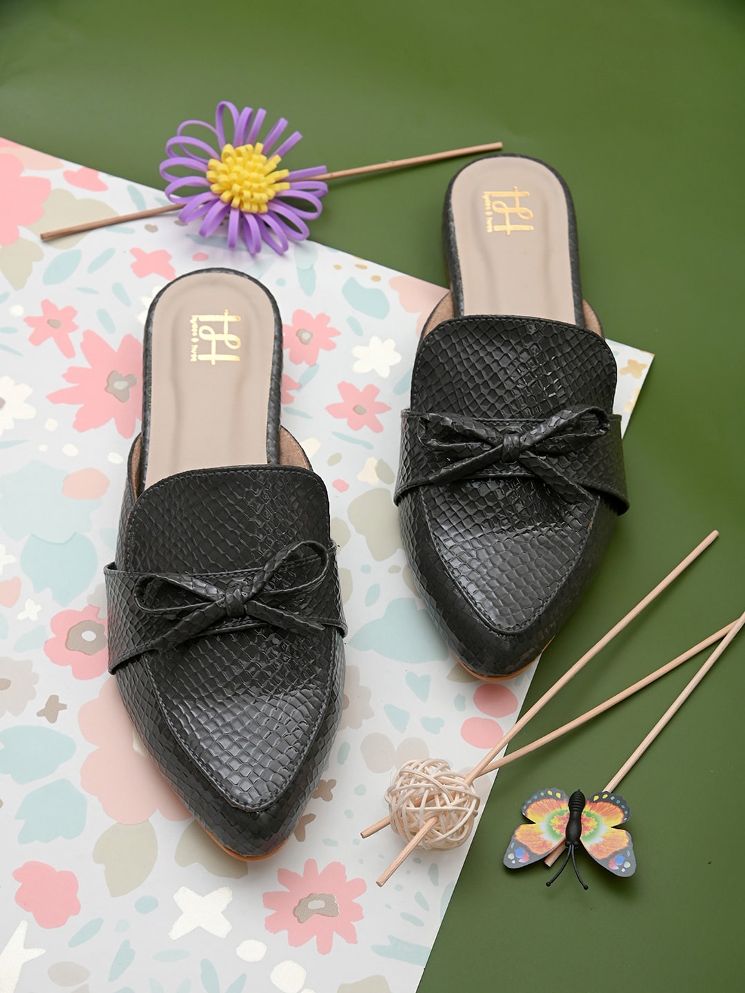 

Hydes N Hues Women Black Textured Mules with Bows Flats