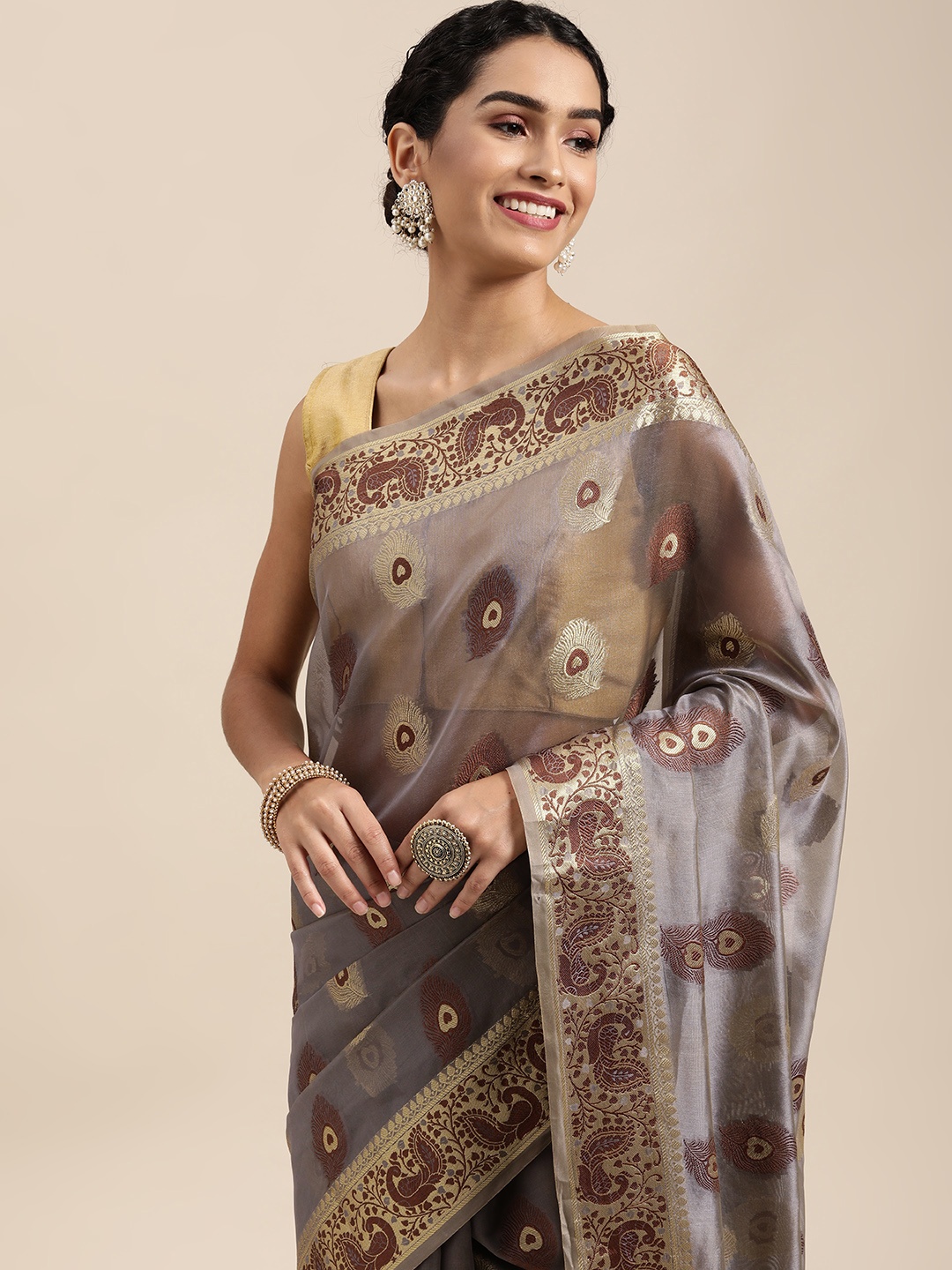 

Mitera Grey & Golden Ethnic Motifs Zari Organza Saree