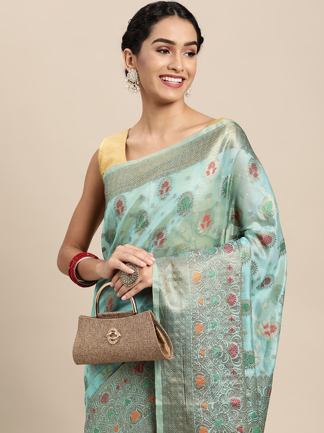 

Mitera Blue & Gold-Toned Ethnic Motifs Zari Organza Saree