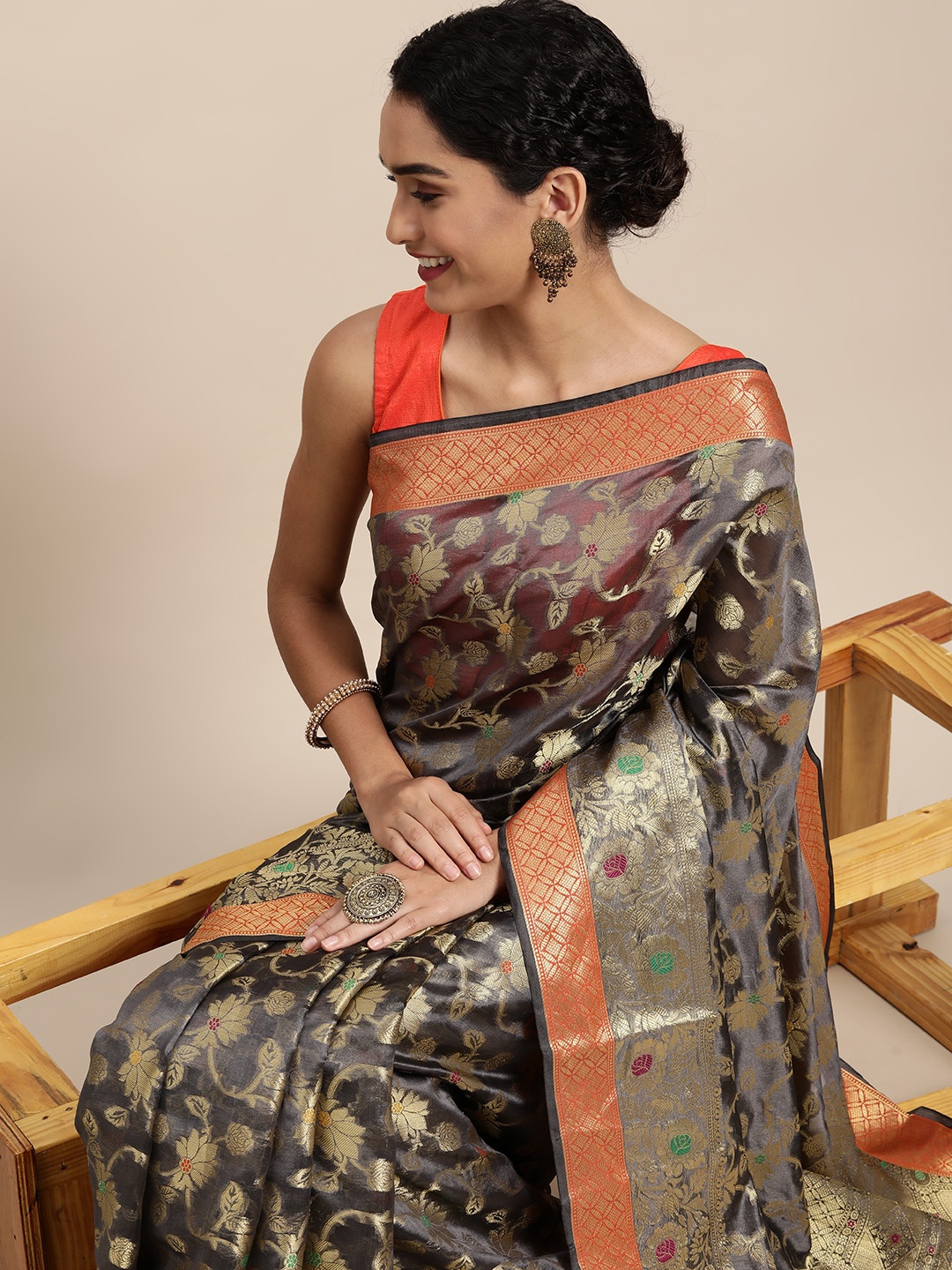 

Mitera Charcoal & Gold-Toned Ethnic Motifs Zari Organza Saree