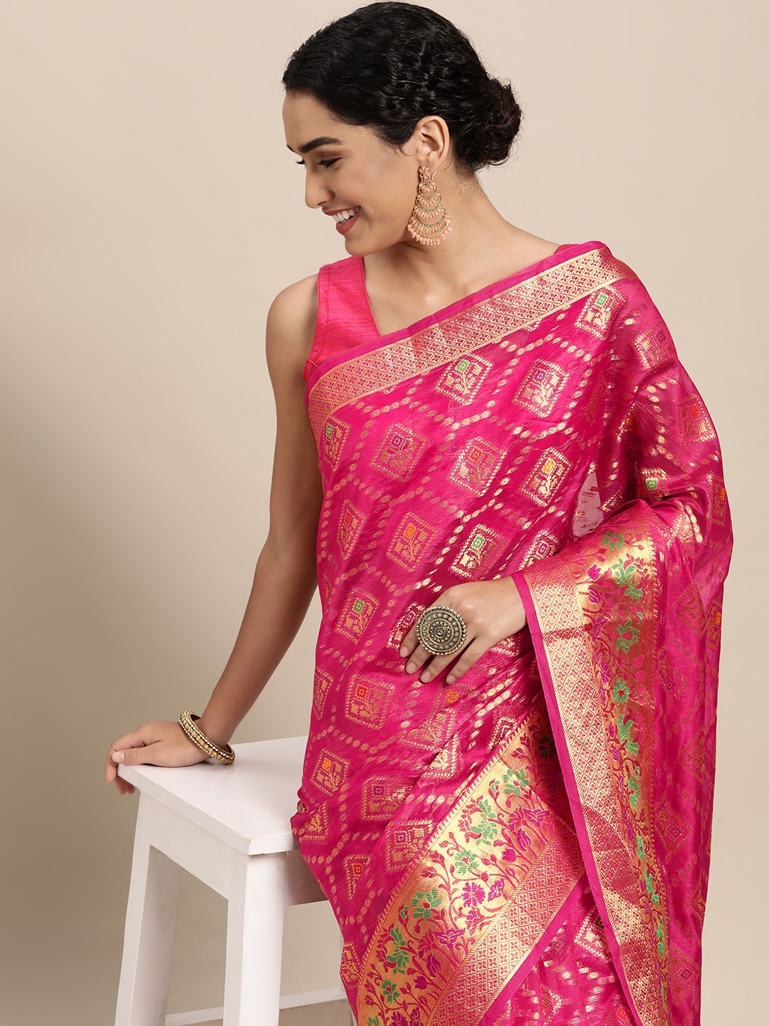 

Mitera Pink & Gold-Toned Ethnic Motifs Zari Organza Saree