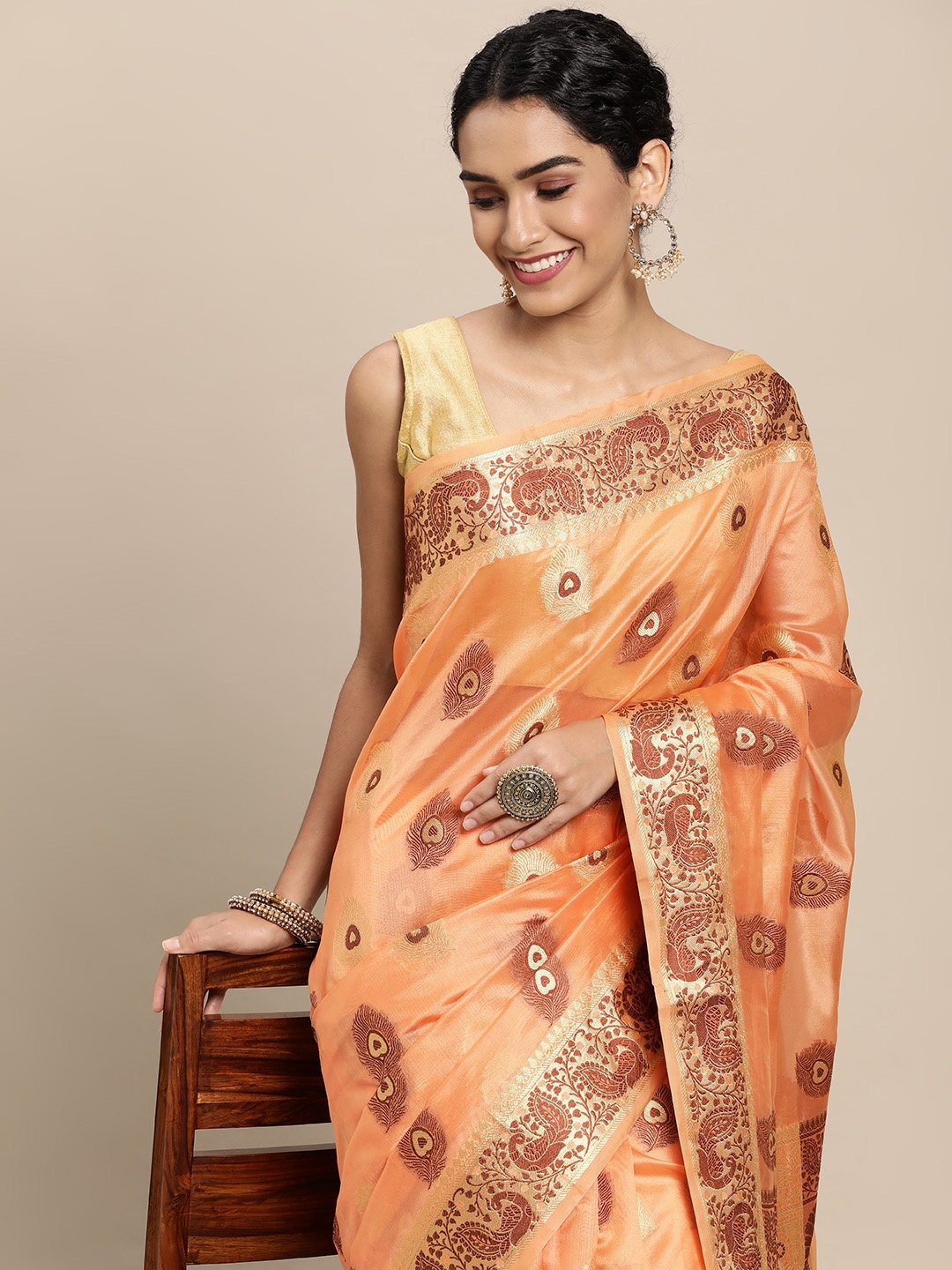 

Mitera Coral & Gold-Toned Ethnic Motifs Zari Organza Saree