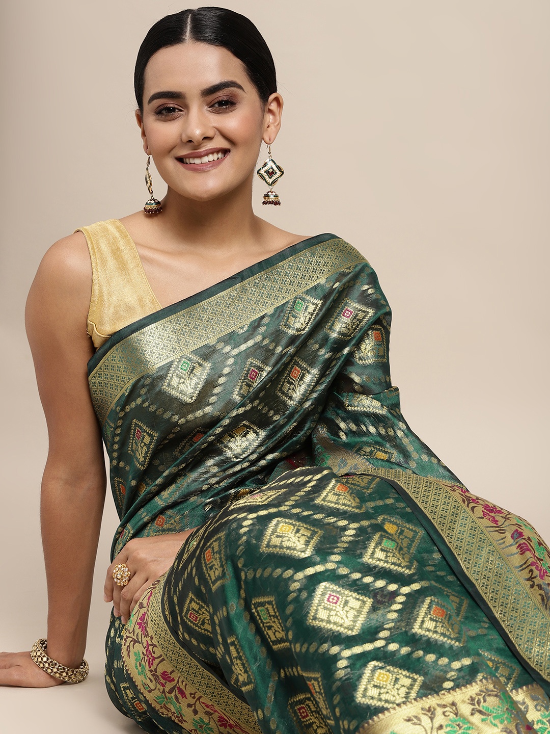 

Mitera Green Ethnic Motifs Zari Organza Kanjeevaram Saree