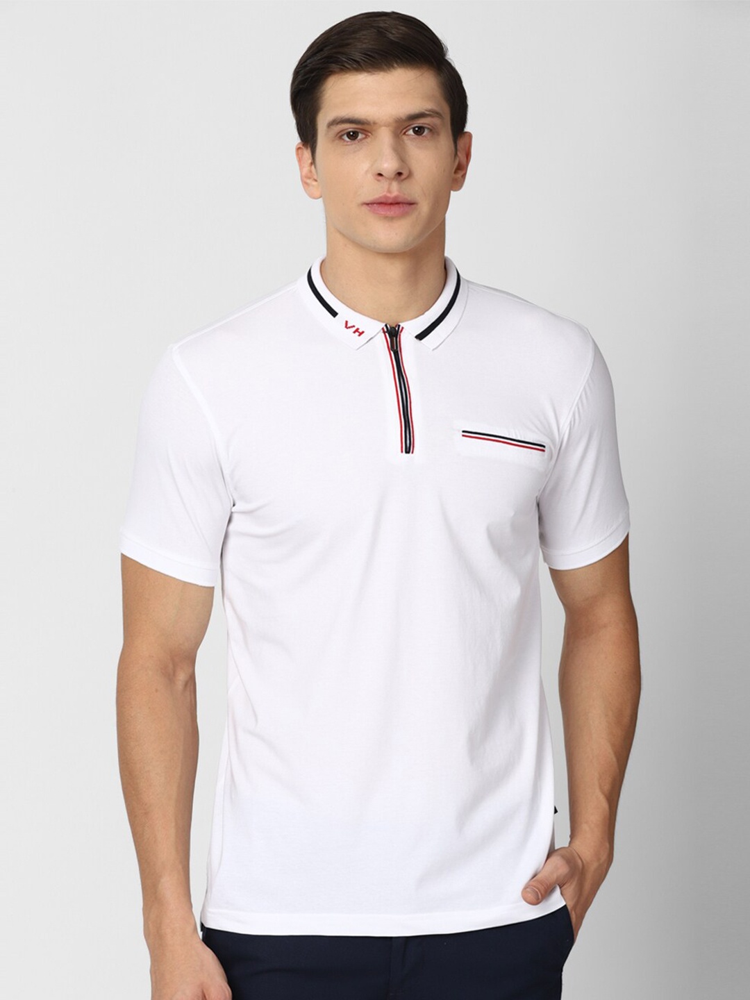 

Van Heusen Sport Men White Solid Polo Collar T-shirt