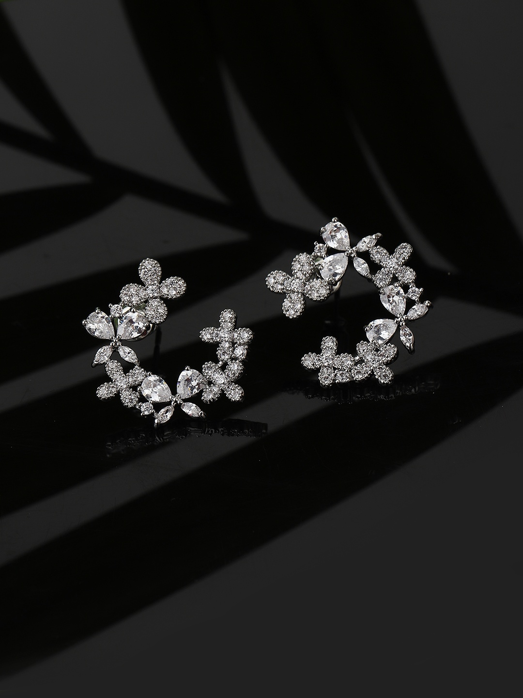 

Carlton London Silver-Toned Floral Studs Earrings