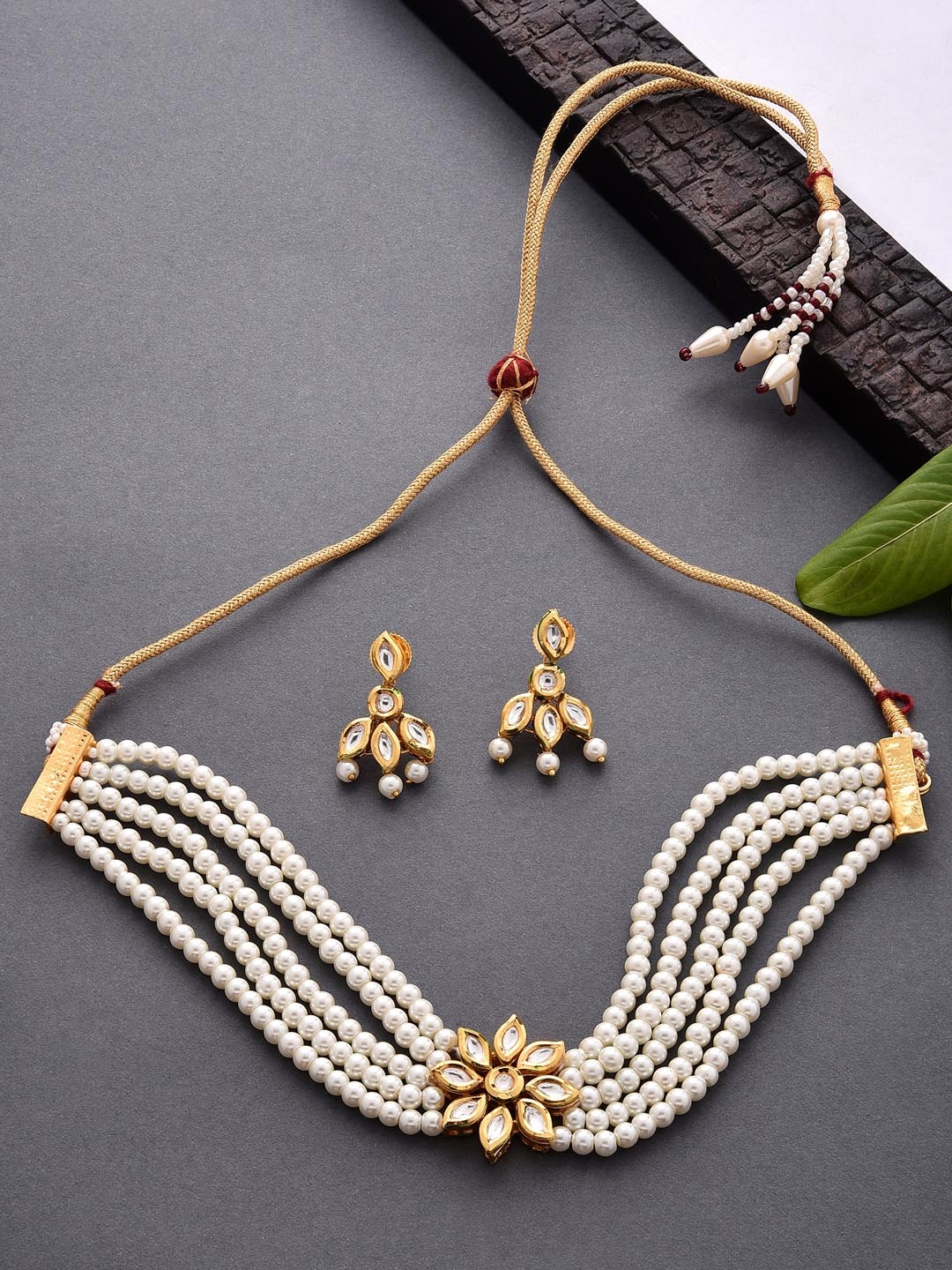 

Fida Gold-Plated & White Kundan Stone Studded & Beaded Jewellery Set