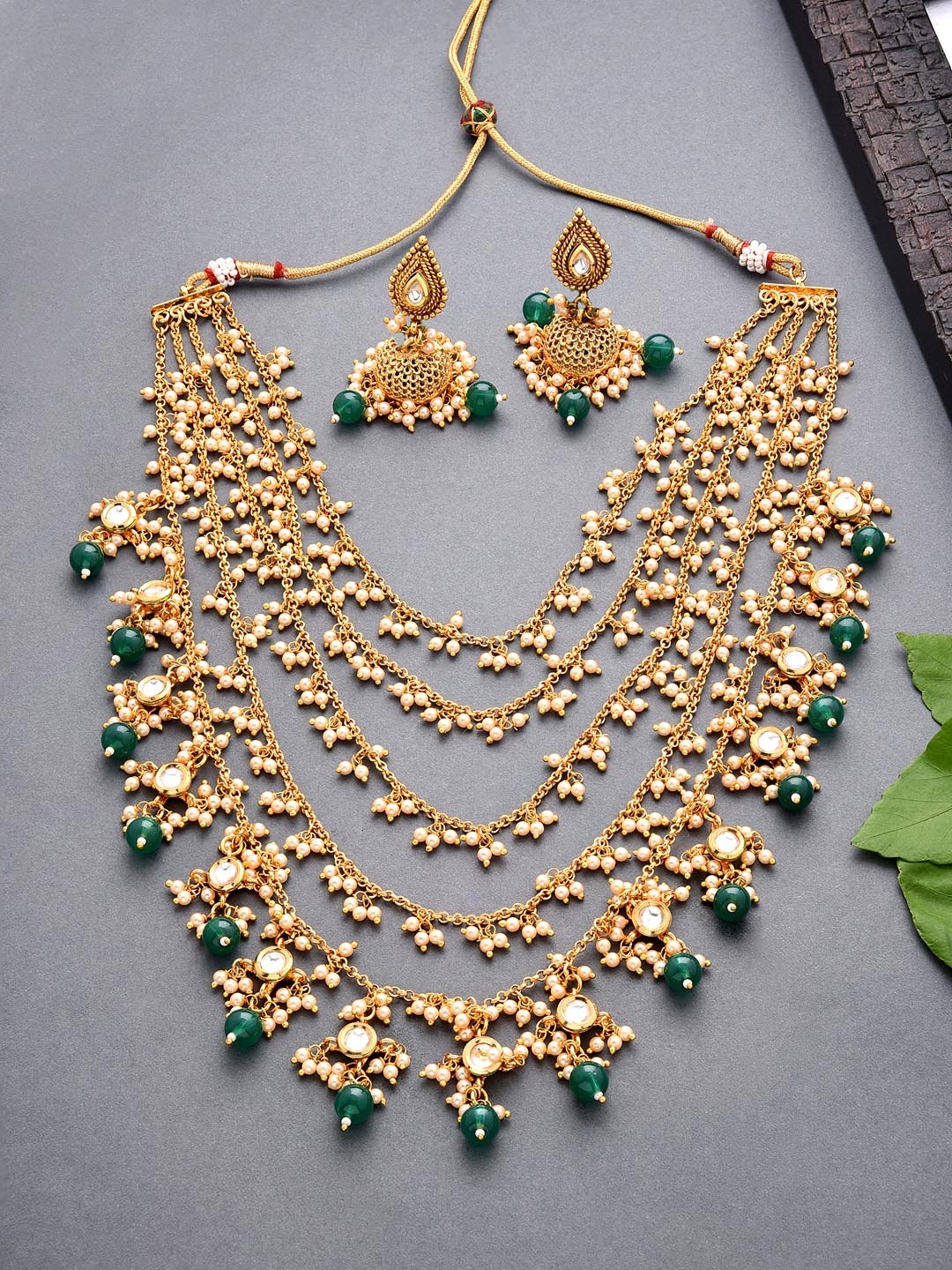 

Fida Gold-Plated Green Kundan Studded Jewellery Set