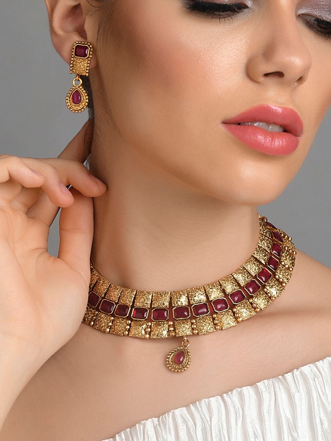 

Fida Gold-Plated Maroon Stone Studded Handcrafted Jewellery Set