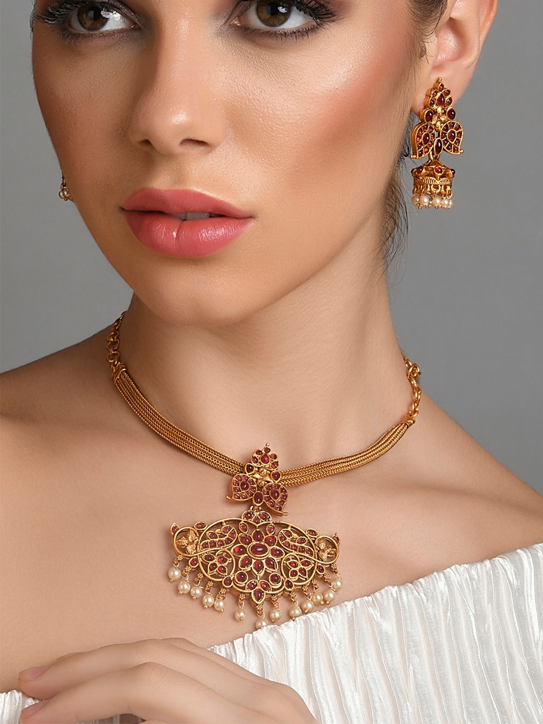 

Fida Gold-Plated & Red Stone Studded & Beaded Jewellery Set