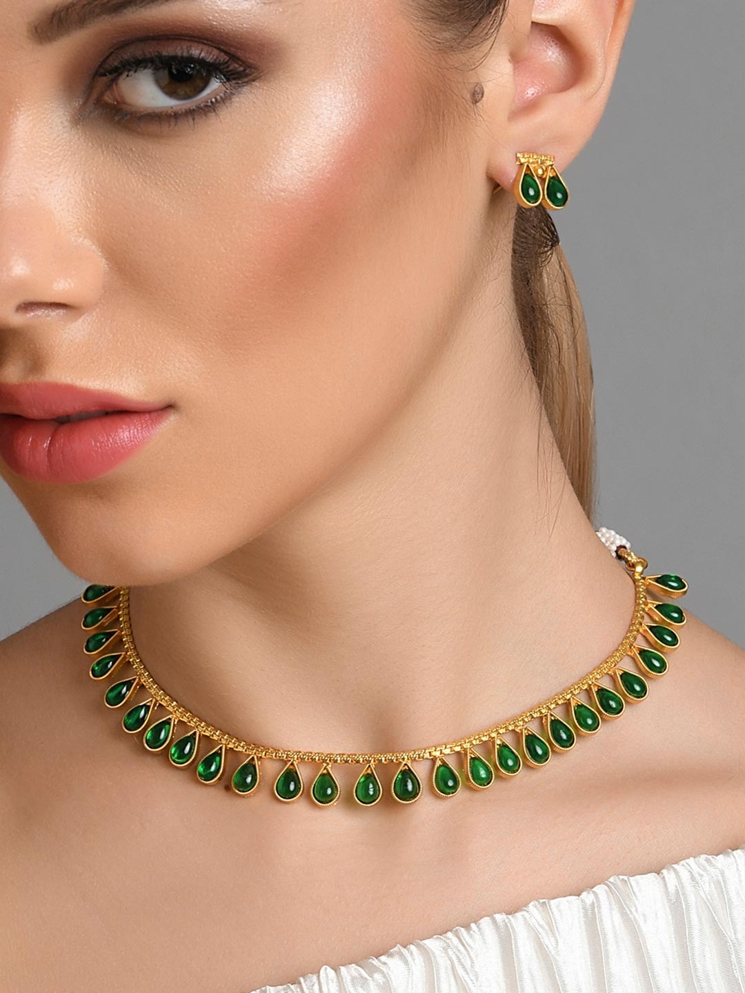 

Fida Women Gold-Plated Green Stone Studded Jewellery Set