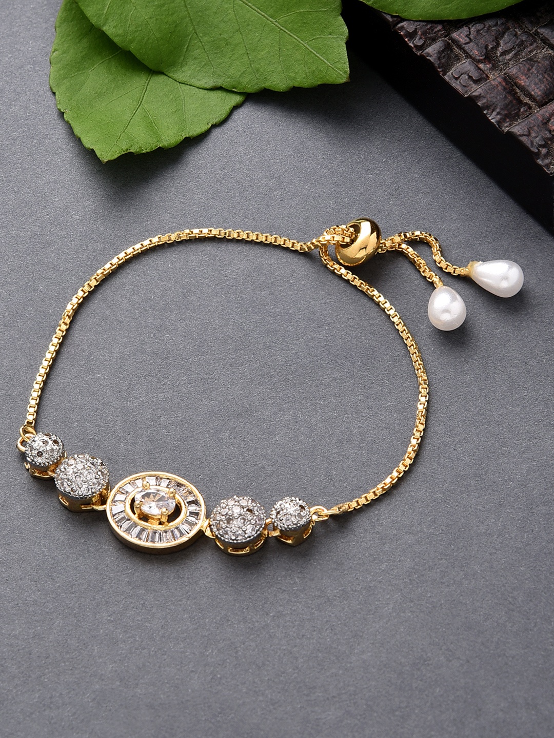 

Fida Women Gold-Toned & White Brass American Diamond Gold-Plated Charm Bracelet