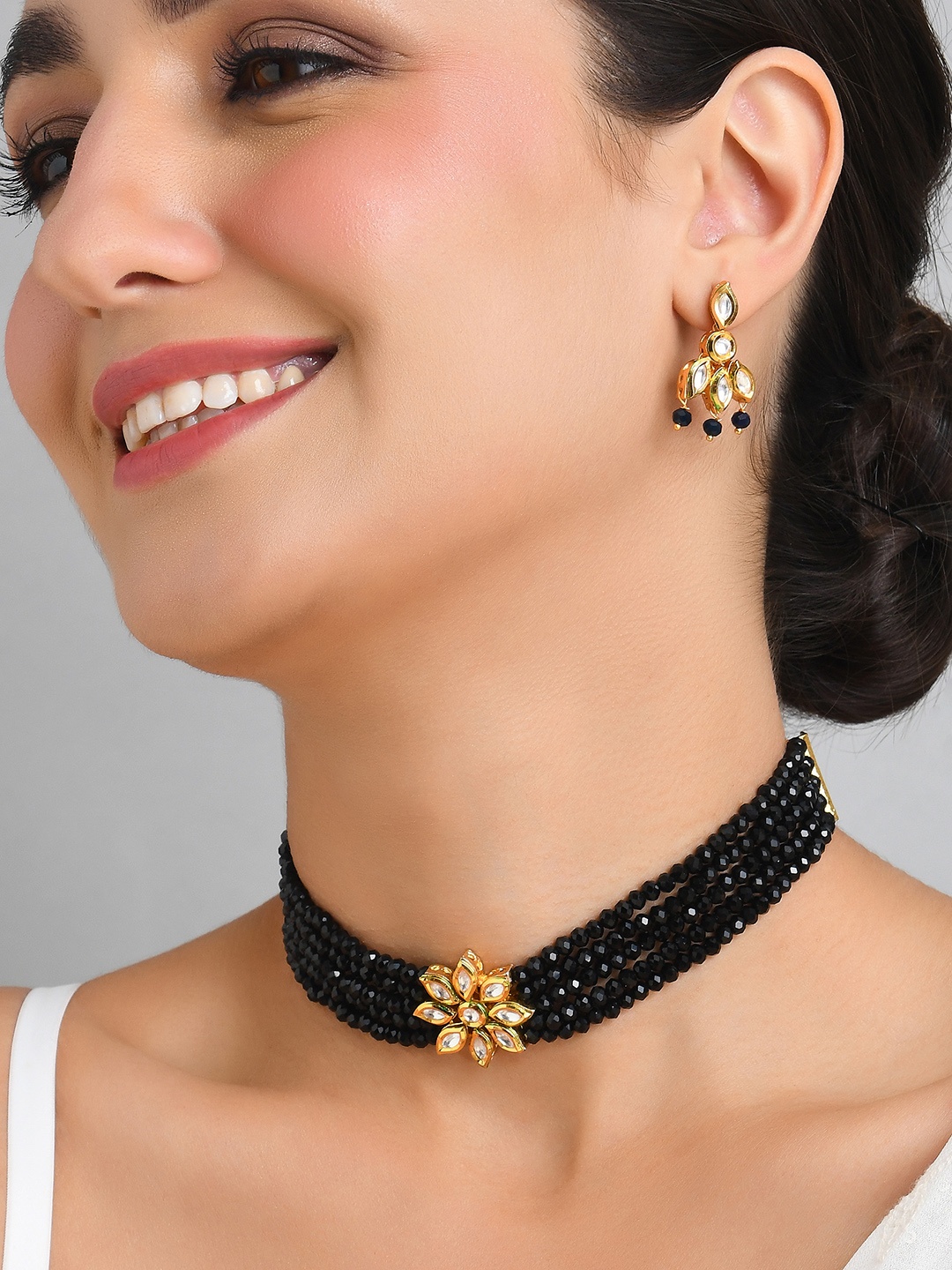 

Fida Gold-Plated Black Kundan-Studded & Pearl Beaded Jewellery Set