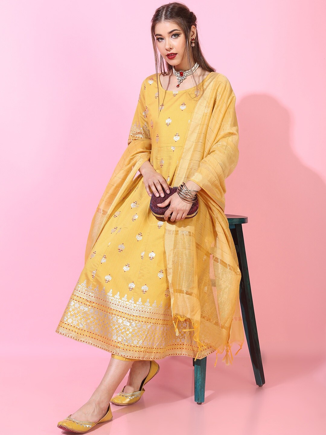 

Vishudh Women Yellow Floral Embroidered Kurta with Palazzos & With Dupatta