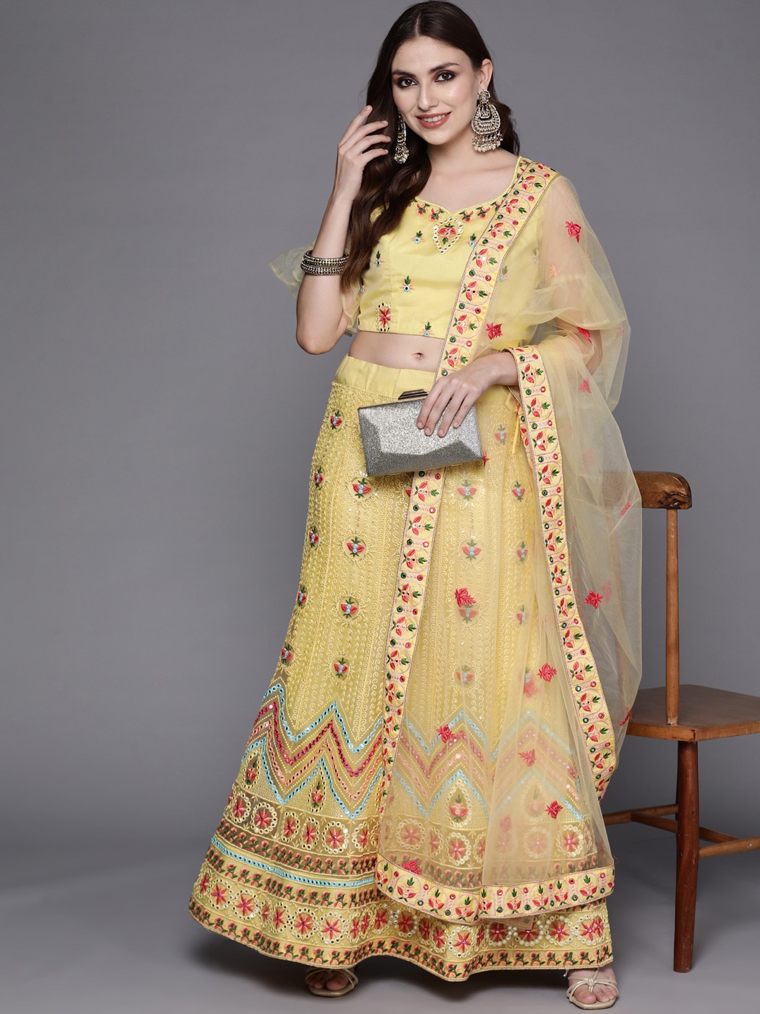 

Chhabra 555 Yellow & Red Embroidered Mirror Work Semi-Stitched Lehenga & Unstitched Blouse With Dupatta