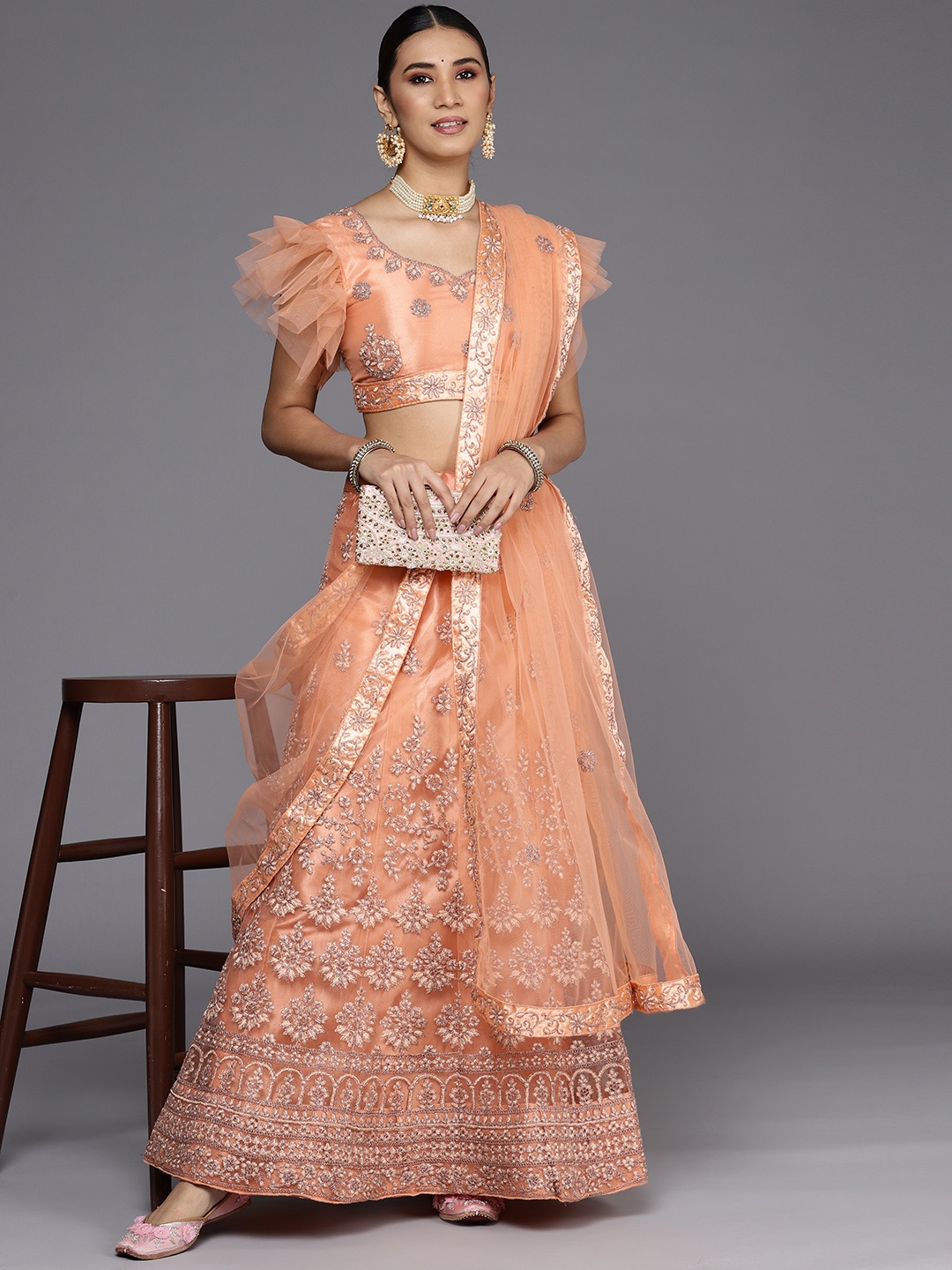 

Chhabra 555 Peach-Coloured Semi-Stitched Lehenga & Unstitched Blouse With Dupatta